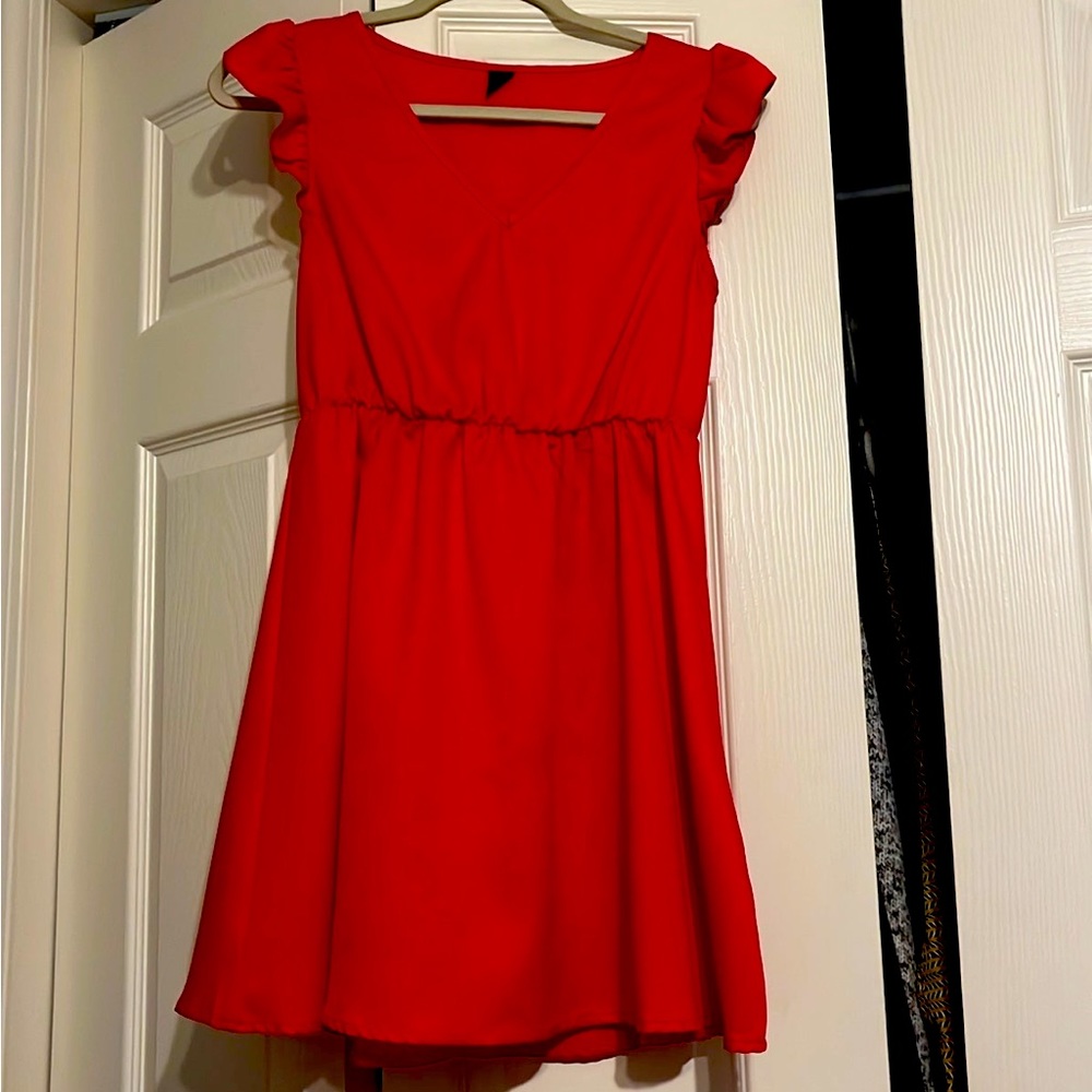 Ruffled knee length cap sleeve dress